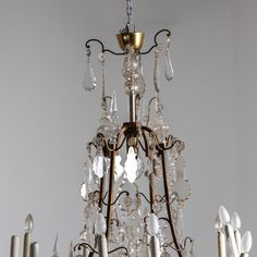 a chandelier with several candles in it