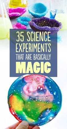 a hand holding up an object with the words 35 science experiments that are basically magic