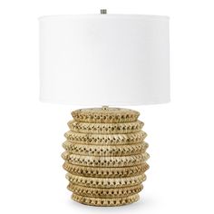 a table lamp with a white shade on it