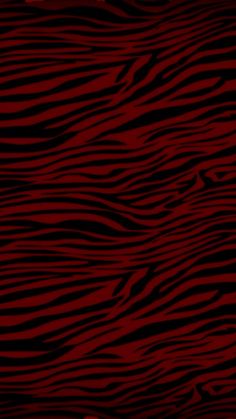 a red and black background with zebra stripes