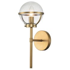 an outdoor wall light with a glass ball on the top and gold metal arm, against a white background