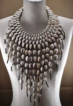 Royal Cowrie (Bib) Necklace | From the Etsy store Muso Masiri (The Decoration of Women) | Made by artist Baba Berthe | $120 | tribal necklace inspiration Pistachio Shells, Nautical Necklace, Seashell Necklace, African Jewelry, Cowrie Shell, Shell Jewelry, Shell Necklaces, Ethnic Jewelry, Tahiti