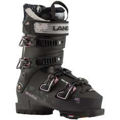 a pair of black ski boots with pink accents