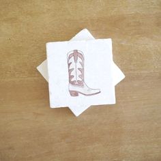 a napkin with a drawing of a boot on it