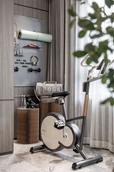 an exercise bike in the corner of a room