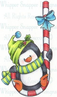 a penguin with a hat and scarf holding a candy cane