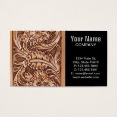 a business card with an intricate carving pattern on the front and back of it,