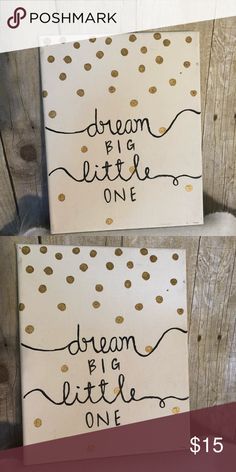 two canvases with the words dream and little one painted on them