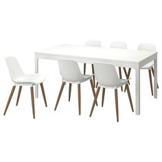 a white table with six chairs around it and one chair on the other side that is upholstered