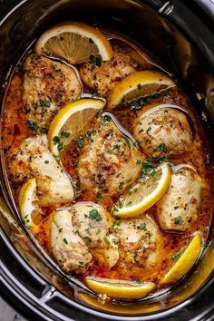 chicken with lemons and herbs in a slow cooker