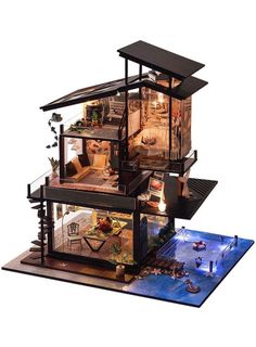 a doll house with all the furniture and accessories in it's display case is shown