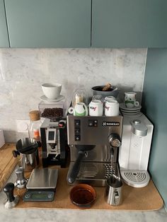 a coffee machine sitting on top of a counter