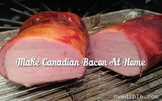 two pieces of meat sitting on top of an oven rack next to each other with the words make canadian bacon at home