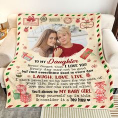 a personalized blanket with an image of two women hugging each other and saying, to my daughter i love you