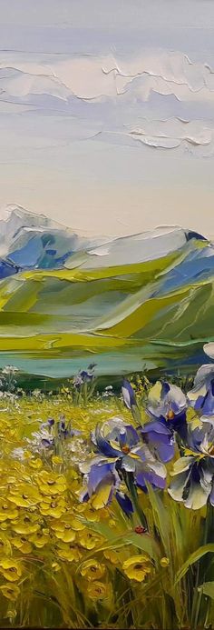 an oil painting of blue and white flowers in a field with mountains in the background