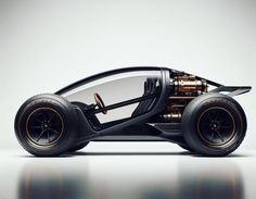 an image of a car that is in the shape of a buggy with gold rims