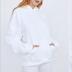 White Aritzia Tna Mega Hoodie, Super Comfortable. Size 1 White Hooded Sweater With Drawstring, White Cozy Fit Athleisure Sweats, White Cozy Fit Sweats For Athleisure, White Cozy Fit Sporty Sweatshirt, White Sporty Sweats With Kangaroo Pocket, White Double-lined Hooded Sweatshirt For Winter, White Double-lined Hood Winter Sweatshirt, White Sweater With Drawstring Hood And Relaxed Fit, White Relaxed Fit Sweater With Drawstring Hood