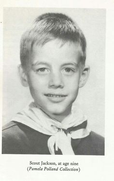 an old black and white photo of a young boy