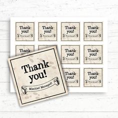 thank you cards and envelopes with the words thank you in black ink on white paper