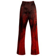 Number vintage couture from the 1990s by Jean-Louis Scherrer! Hand painted red and black silk trousers. Unlined with side zip and button closure. Hidden front pockets. The marked size is 42, and the pants fit like a modern size small-medium. 100% silk. The waist measure 27", hips 37.75", front rise 12.5", rear rise 16", inseam 29.5", seam allowance 2.25" and the total length 41". Excellent vintage condition with no noted flaws. Made in Paris. 1990s Couture, Black And Red Pants, Jean Louis Scherrer, Striped Palazzo Pants, High Clothes, Designer Pants, Seam Allowance, Patterned Jeans, Red Jeans