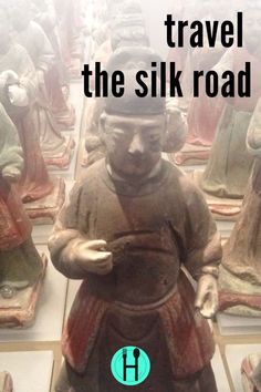 there are many statues on display with the words travel the silk road