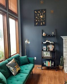 a living room filled with furniture and a fire place