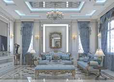 an elegant living room with blue and white furniture, chandelier, mirror, couches, coffee table and lamps