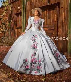 Be selfie ready in this three-piece floral charro off the shoulder ball gown with A-line skirt by Ragazza Fashion M50-150. This beautiful long off the shoulder dress features a sweetheart corset bodice, open lace-up back, and a floor length A-line skirt with a sweep train. The bolero jacket is included – giving you a versatile second look throughout your party! The cowboy hat shown in the catalog pictures is not included. 3-Piece Charro Quinceanera Dress by Ragazza M50-150 Designer: Morena y Esencial Pioneer Collection by Ragazza Fashion 2024 Style Number: M50-150 Colors: Silver/Fuchsia Pink Sizes: 3, 5, 7, 9, 11, 13, 15 Since this is a three-piece dress, the top skirt and bodice are removable. We love this because it gives you multiple looks throughout your party. The cowboy hat shown in 15 Quinceanera Dresses, 1500 Dresses, 15 Quinceanera, Charro Quinceanera Dresses, Quinceañera Dresses, Sweetheart Corset, Embroidered Corset, 15 Dresses Quinceanera, Small Jacket