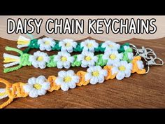 crochet daisy chain keychains with the words daisy chain chains on it