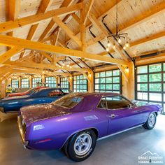 Our brand new Car Barn Series drew inspiration from this custom barn in Vermont. This customer showcases classic cars in all eight bays, each with clear overhead doors and soaring post trusses. #greatcountrytimberframes #timberframe #postandbeam #barnbuilders #timberframing #mortiseandtenon #joinery #buildersofinsta #keepcraftalive #timberframer #carbarn #custombarn #barngoals #barns #barnliving #car #classiccar #tby6958