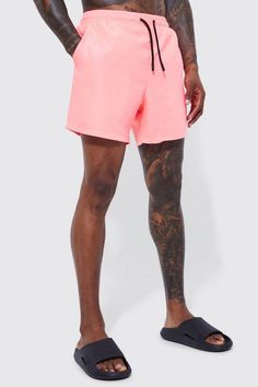 If it's comfort that you're looking for in men's holiday fashion, pick a pair of shorts from our unrivalled selection. You haven't been skipping leg day, have you? No, we know you wouldn't. All the better as you'll want to sport some of our stylish denim shorts, chino shorts, jersey shorts or cargo shorts. If you're looking for new outfit ideas for this summer, consider pairing a horizontal striped t-shirt with jean shorts or opt for a printed shirt and chino shorts for a smarter combo. Round off with a pair of sliders or loafers for extra style points. A Bigger Splash, Plus Size Joggers, Gym Jacket, Going Out Trousers, Going Out Shirts, Pink Swim, Party Mode, Gym Hoodie, Men's Swimwear