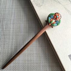 This is an order to make list, please allow 2 weeks before shipping. Crafted from pure natural ebony wood, the hairpin measures 17.6cm in length.  This elegant hairpin is made from natural peach wood, featuring hand-sculpted polymer clay fortune pattern on both sides. Its 3D design and unique Oriental charm make it a standout piece.  Available in two sizes: 17.6cm Unique gift you can choose for yourself, or your family and friends :-) Floral Letters Diy, Polymer Clay Hair Accessories, Clay Peach, Mini Polymer Clay, Letter Diy, Chinese Hairpin, Free Standing Lace, Hair Fork, Artificial Silk Flowers