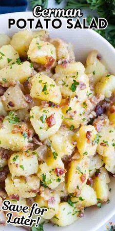 a white bowl filled with potato salad on top of a table