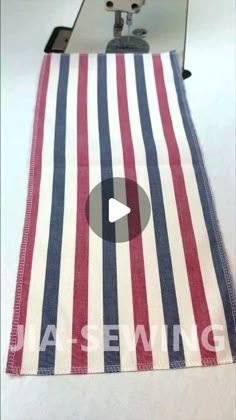 a video demonstrating how to sew on an american flag table runner with the sewing machine