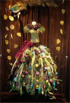 a dress made out of feathers and ornaments