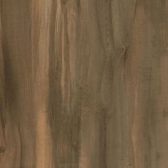 a close up view of the wood grains on this flooring material, which is brown