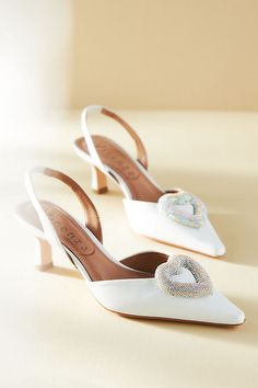 Finished with a rhinestone-encrusted heart, these pointed-toe slingback pumps are ready for all your magical moments. | Heart Slingback Kitten-Heel Pumps by Vicenza in White, Women's, Size: 36, Leather at Anthropologie Cream Heels Wedding, Wedding Kitten Heels, Lace Kitten Heels, Barker Wedding, Classic Wedding Shoes, White Kitten Heels, Bridal 2023, White Kitten, Wedding Shoes Bride