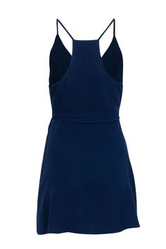 Get ready to make a statement in this Amanda Uprichard navy sleeveless wrap mini dress! Perfect for a date night or night of dancing, this dress exudes charm and style. Pair it with a strappy open-toe heel and silver jewelry for a complete head-turning look. Size S 100% Polyester Unlined Wrap tie closure Sleeveless Bust 30" Waist 23" Shoulder to hem 34.5" Sleeveless Fitted Wrap Dress For Night Out, Chic Sleeveless Wrap Dress For Night Out, Sleeveless Fitted Wrap Dress For Cocktail, Elegant Navy Mini Dress For Night Out, Chic Navy Mini Dress For Date Night, Elegant Blue Sleeveless Wrap Dress, Navy Sleeveless Cocktail Dress, Elegant Sleeveless Blue Wrap Dress, Navy Mini Dress For Summer Night Out