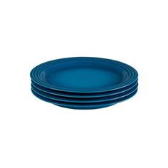 four blue plates stacked on top of each other