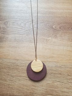 Necklace with wood pendant. Multiple sizes, mutilple wood tones to choose from. Brown Handmade Necklaces For Everyday Wear, Minimalist Brown Necklace For Everyday, Handmade Brown Necklace For Everyday Wear, Everyday Handmade Brown Necklaces, Everyday Handmade Brown Necklace, Brown Wooden Beads Pendant Necklace, Brown Wooden Pendant Jewelry, Adjustable Brown Wooden Necklaces, Earthy Brown Round Necklace