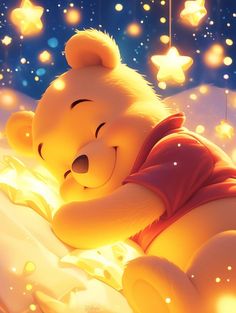 winnie the pooh is laying down with his eyes closed and stars hanging from the ceiling