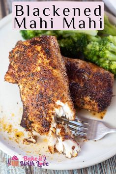 the plate has chicken and broccoli on it, with a fork in it