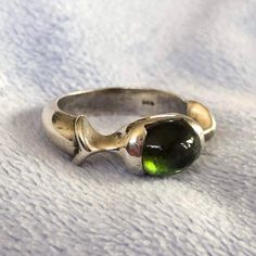 Hello and Welcome to LiamBySevanna! Prior-purchasing any listing from this shop, please Ask question/s, Request additional photos, to make sure the listed item, is the right choice for you! Per our store policy we don't accept returns Listing is for; Equestrian 1970 Brutalist Sterling Silver Ring W/Green Tourmaline Gemstone Size 6.5 ~ wellmade Ring, beautiful design, comfortable & Solid ~ Tourmaline Gemstone is natural inlaid into Sterling setting, in one piece! ~ no prongs, solid ring ~ Ring is a size 6.5 ~ total weight of grams  1960 Brutalist Sterling Silver Ring W/Assorted natural Jelly Opal Gemstones - Gorgeous multi shape & size Jelly Opal gemstones, firmed & secured with prongs - Ring is a size 6 weights grams  Reminder: You can "always" prevent any wrong purchase/s by Communicating Grunge Rings, Jelly Opal, Tourmaline Gemstone, Green Tourmaline, Ring Ring, Opal Gemstone, Handmade Paper, Solitaire Ring, Sterling Silver Ring