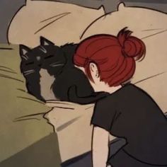 a woman laying in bed next to a black cat