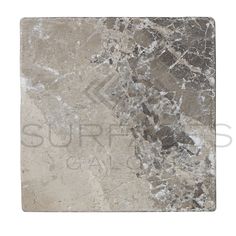 The Tundra Gray (Atlantic Gray) 12x12 Marble Tumbled tile from SurfacesGalore features a square design adorned with shades of gray, beige, and white. Its surface showcases a natural, uneven pattern with darker veins and spots, giving it a polished and glossy texture. The background is white, subtly overlaid with the text Sophisticated Elegance: SurfacesGalore. Tundra Grey Marble, Silver River Marble, Pietra Gray Marble, Silver Tumbled Travertine, Versailles Pattern, Absolute Black Granite, Marble Collection, Calacatta Gold Marble, Travertine Marble