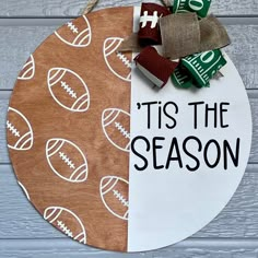 a football themed door hanger that says tis the season