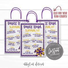 two purple and white bags with the words dance for your team on them, each bag has