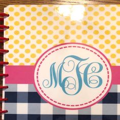 a personalized notebook with a monogrammed circle on the cover