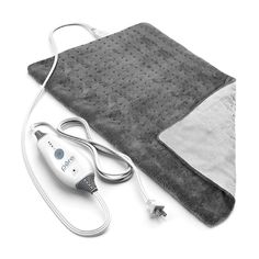 The PureRelief Deluxe Heating Pad from Pure Enrichment offers soothing comfort to the sore muscles in your back, legs, arms and more. Made with the softest Microplush fibers, this deluxe heating pad is an ultra-cozy heat therapy solution for arthritic pain, muscle ache and stiff joints. Use for 20 minutes daily (or as rmended by your doctor) to increase blood flow and reduce pain and muscle spasms. Large 12" x 24" pad offers excellent coverage for large muscle groups. Adjust the heat easily with Himalayan Rock Salt Lamp, Rock Lamp, Weighted Lap Pad, College Packing Lists, Packing Essentials List, Arthritic Pain, College Packing, Heating Pads, Moist Heat