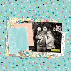 a scrapbook page with polka dot paper and an image of two women holding a baby